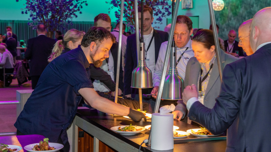 Kok aan het werk tijdens event in Evenementenhal Easyfairs